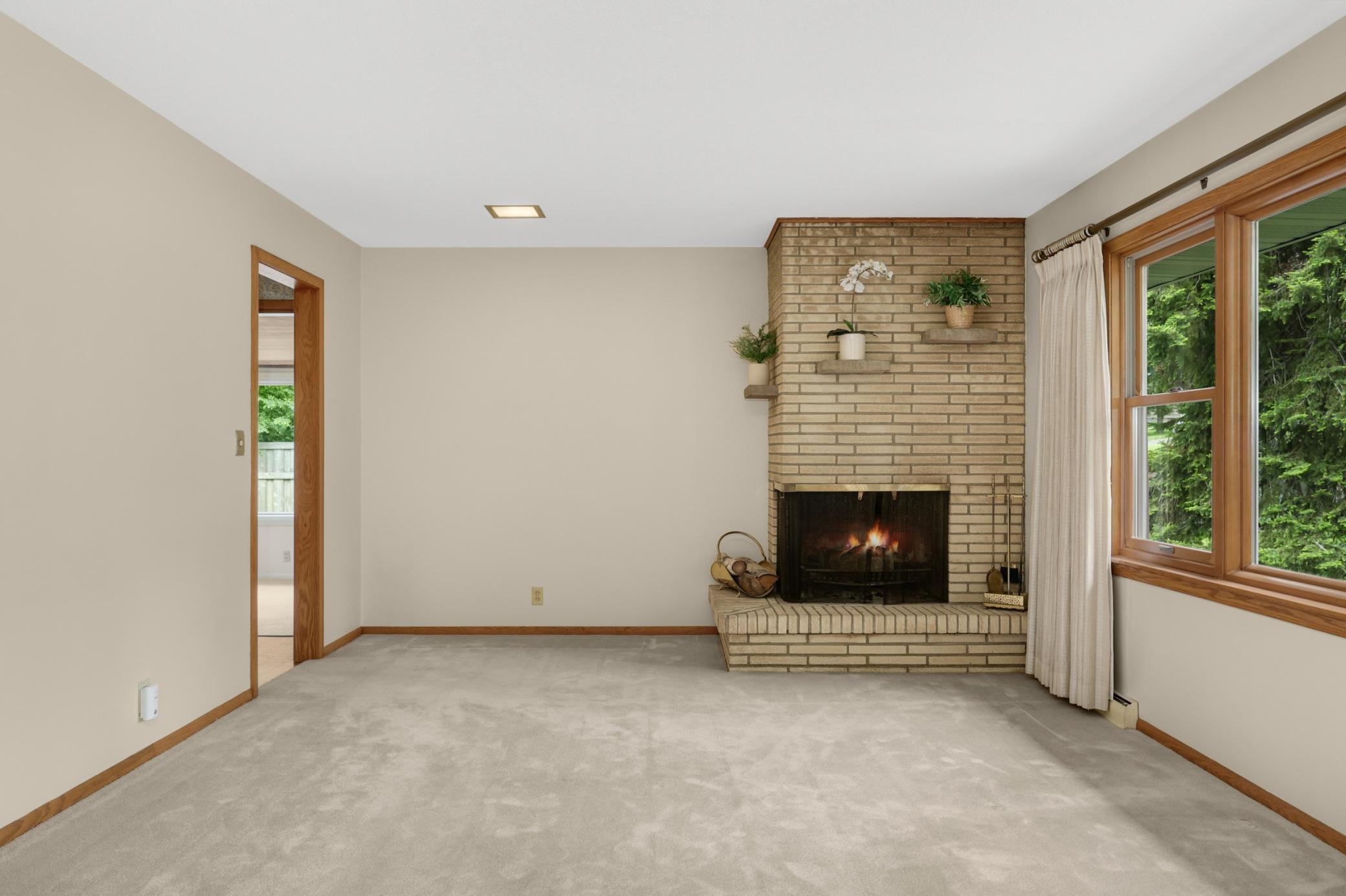 I might be getting ahead of myself, but can you imagine how cute this fireplace could be decorated for the holidays?