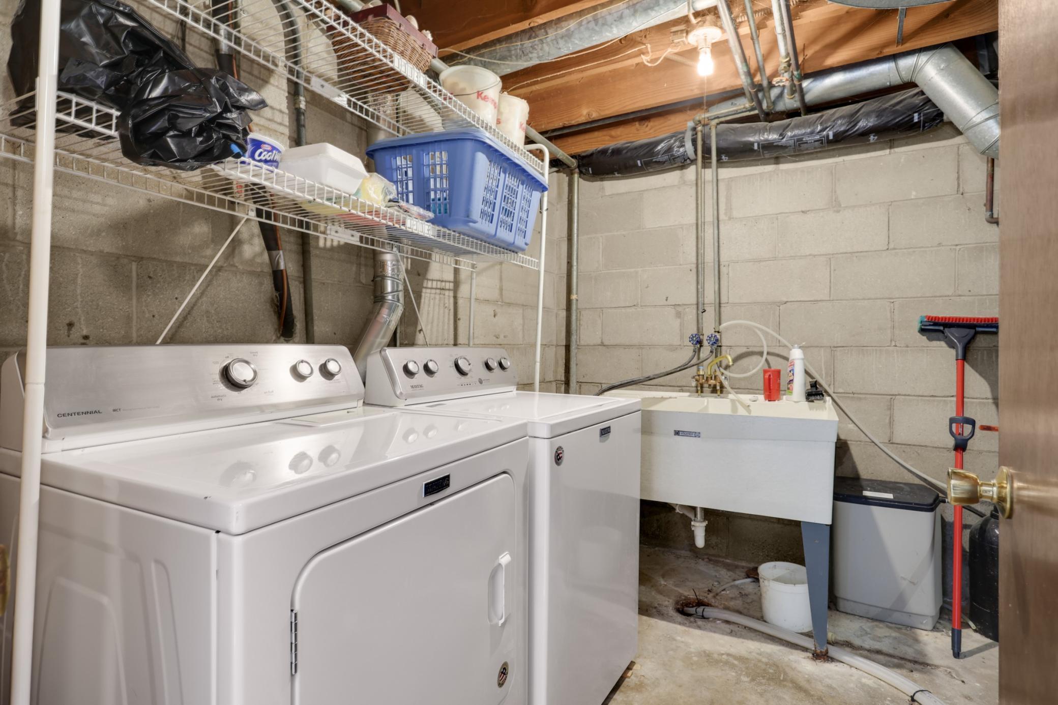 Enjoy newer washer and dryer, a wash tub, and a water softener that's owned.
