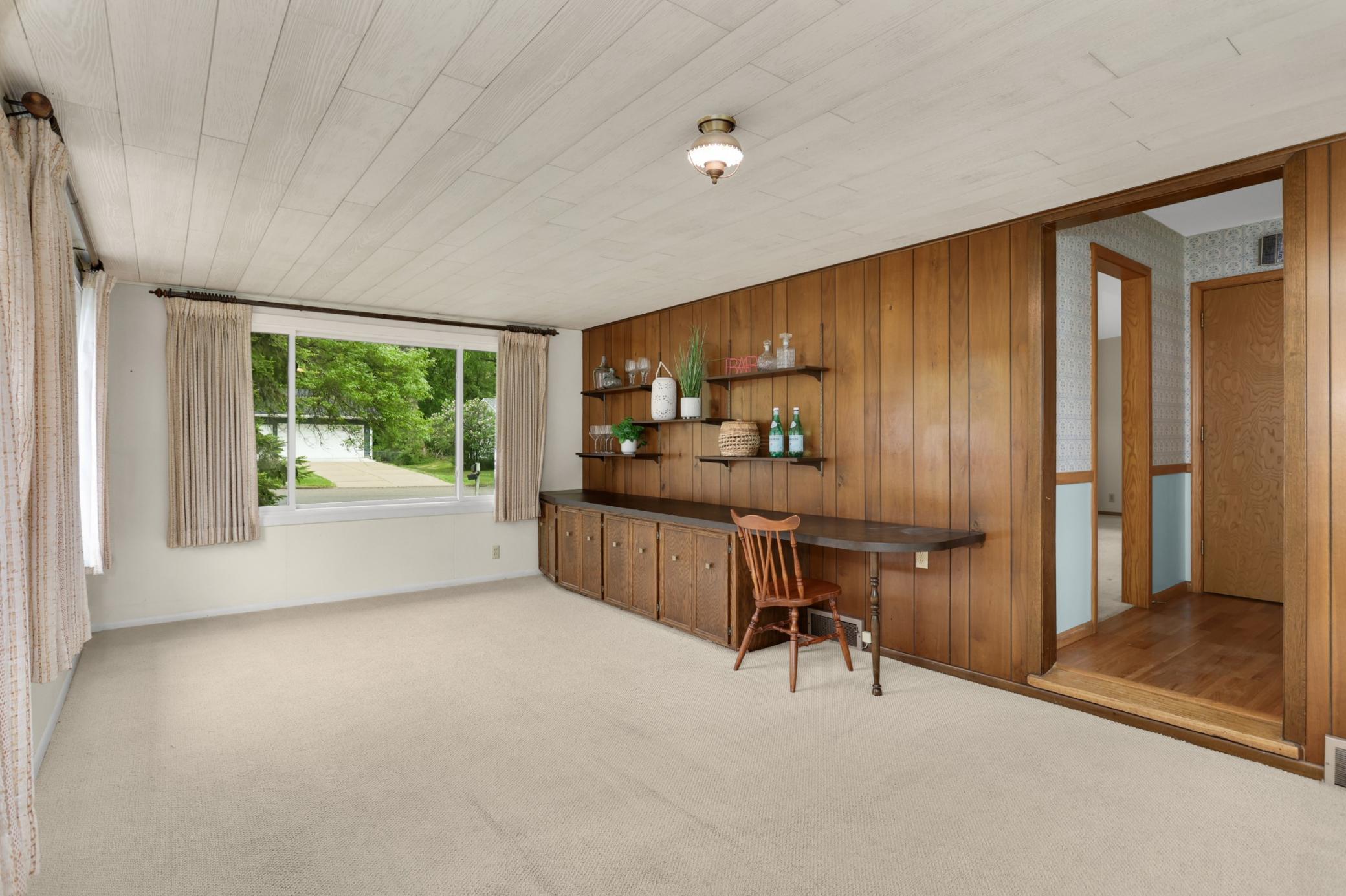 I love the retro built-ins and paneling. It's totally a vibe.