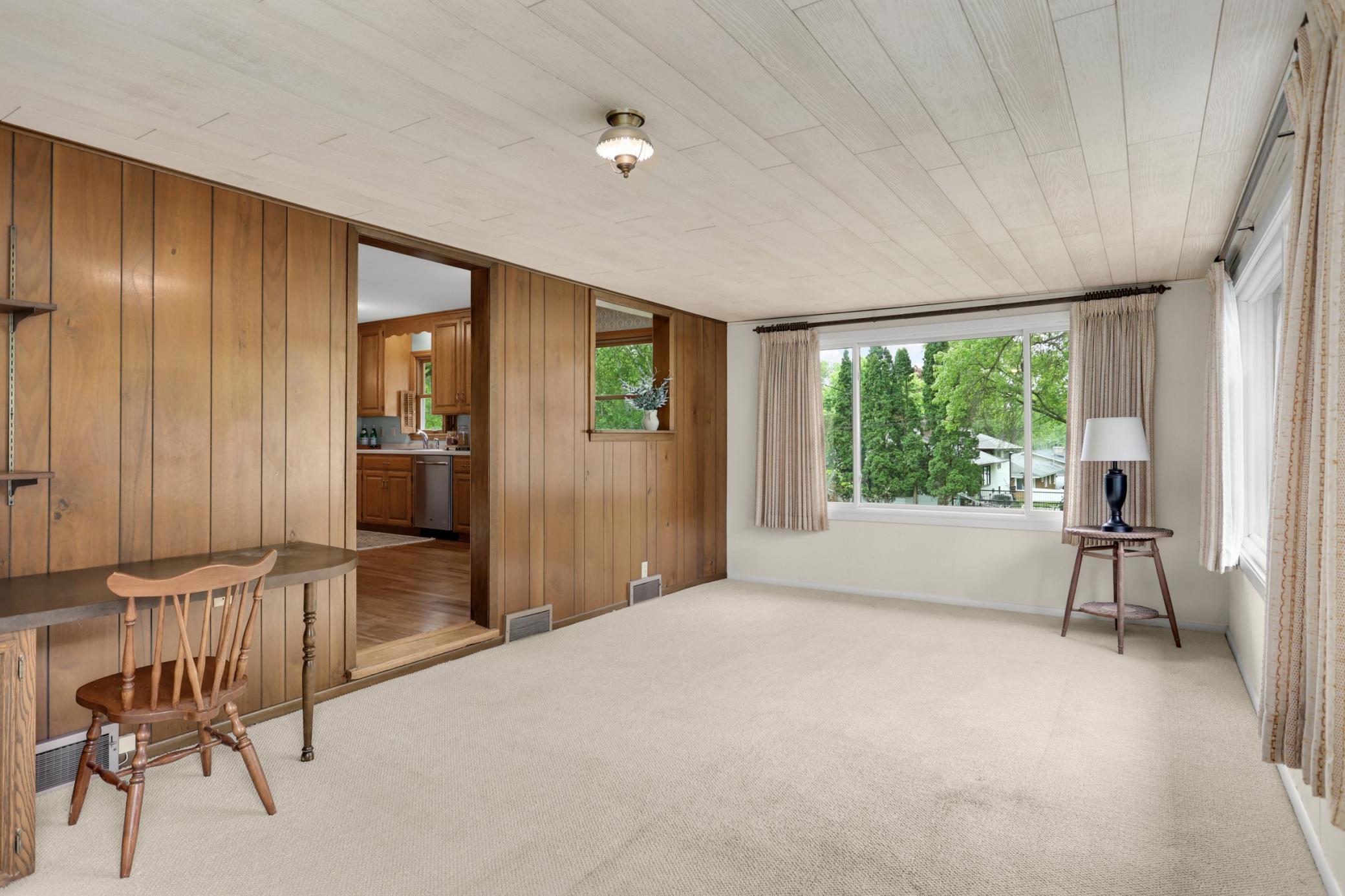 Access the side patio from the Sun Room for easy grilling and entertaining.