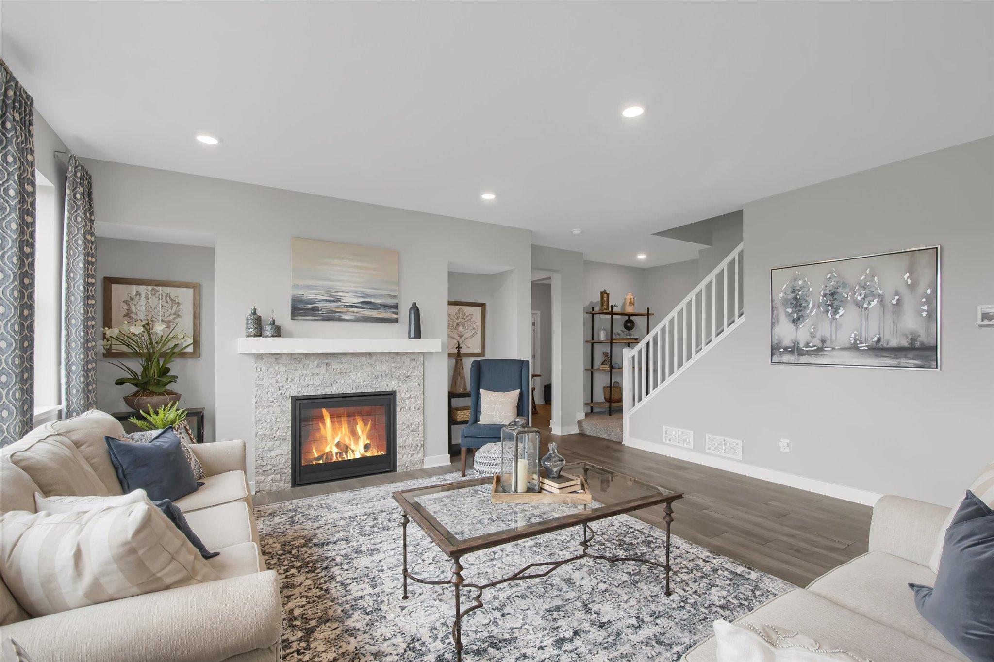 Cozy up next to your gas fireplace with a good book on a chilly day/evening (colors and options may vary).