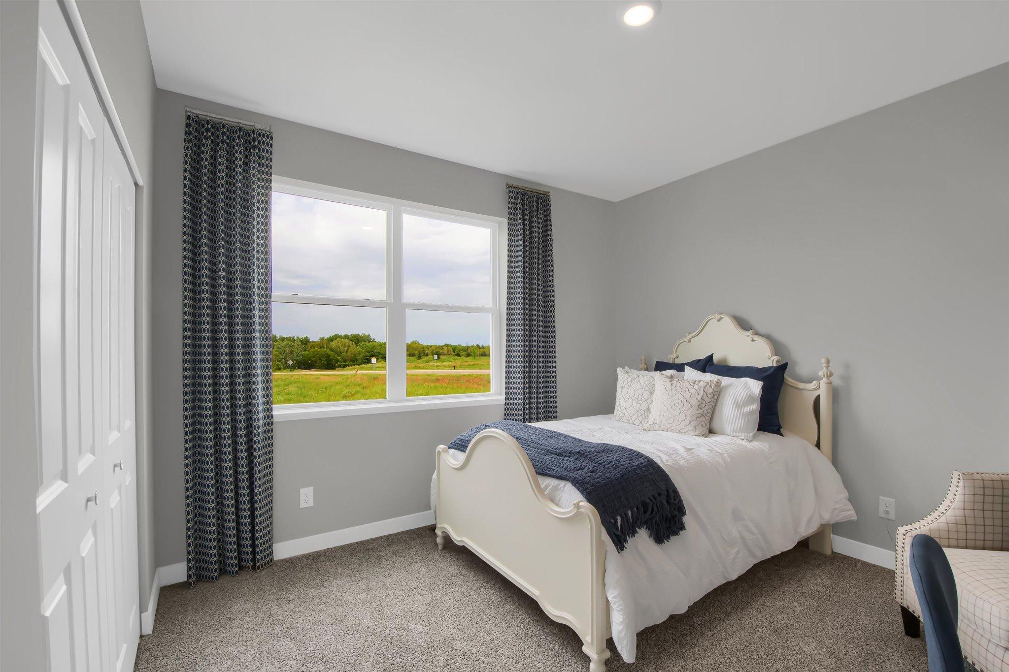 Main level guest room.