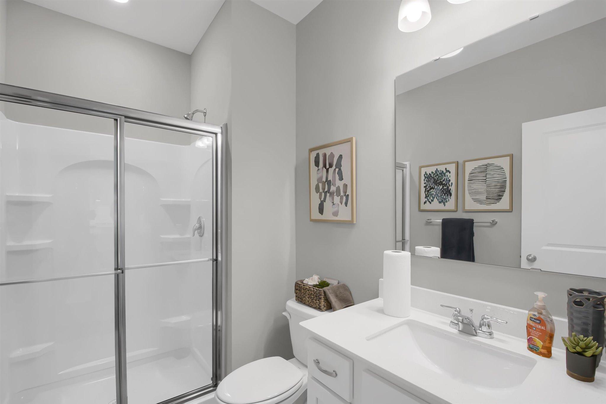 Main level bathroom for guests.