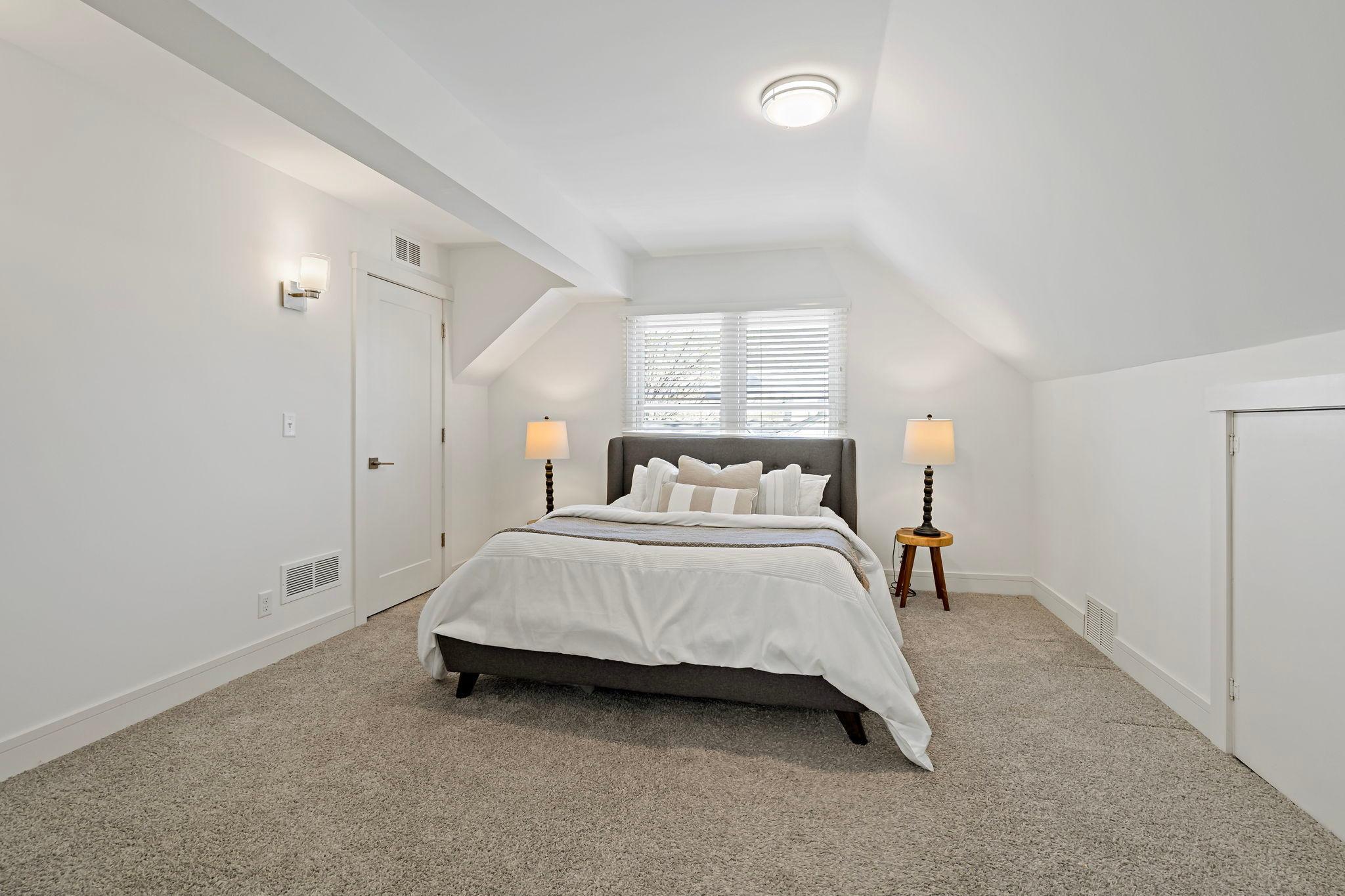 Upper level primary bedroom with large closet