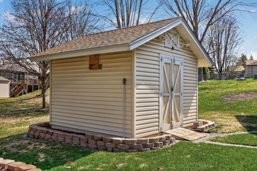 Attic storage and power in the wood framed storage shed