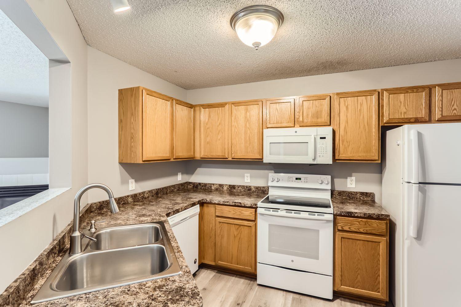 1869 E 122nd Street - Web Quality - 006 - 10 2nd Floor Kitchen.jpg