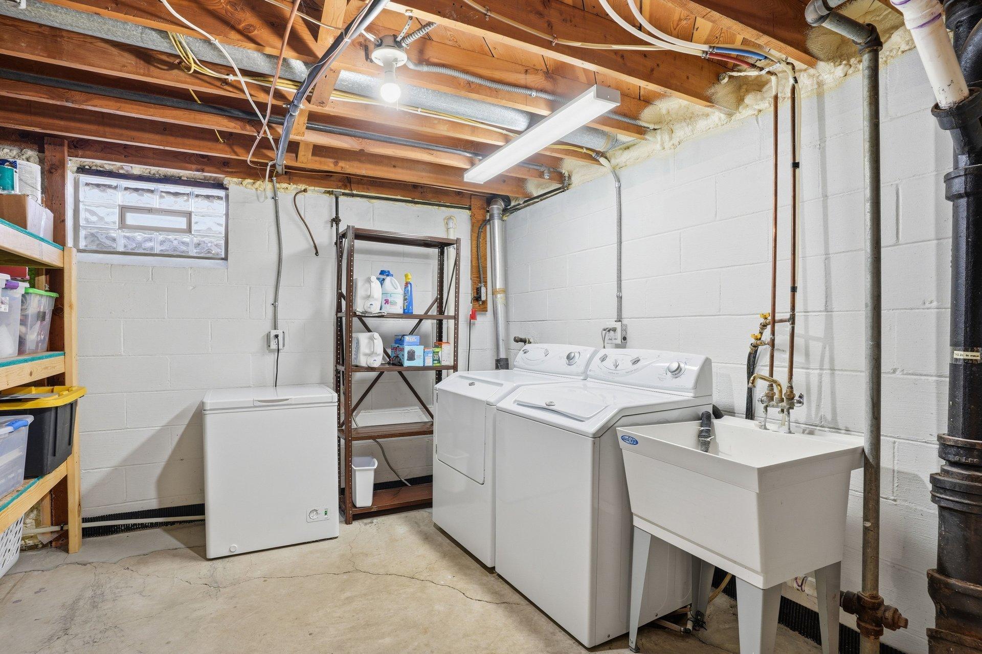 Lower level laundry, storage & mechanicals