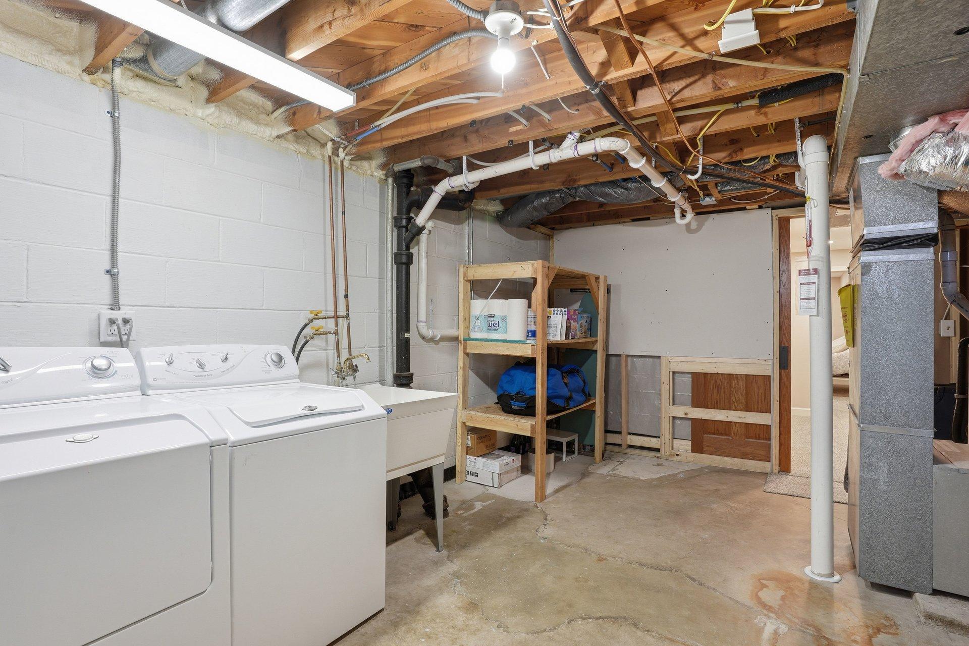 Lower level laundry, storage & mechanicals