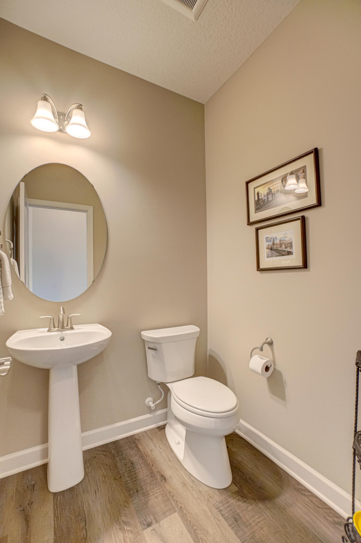 Thoughtfully located, this main-level half bath is perfect for entertaining and guest use