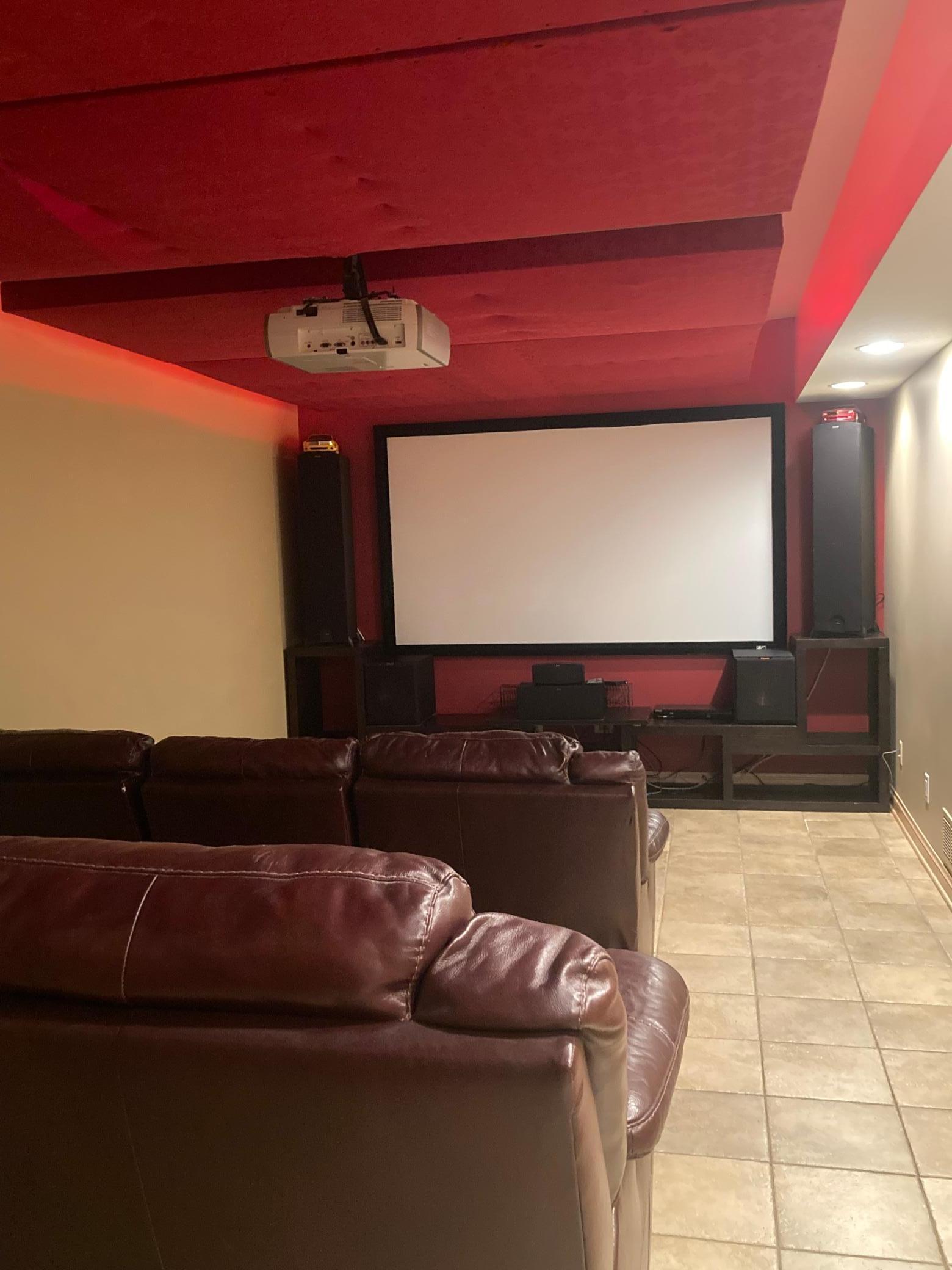 Theatre room with projector & power recline stadium seating