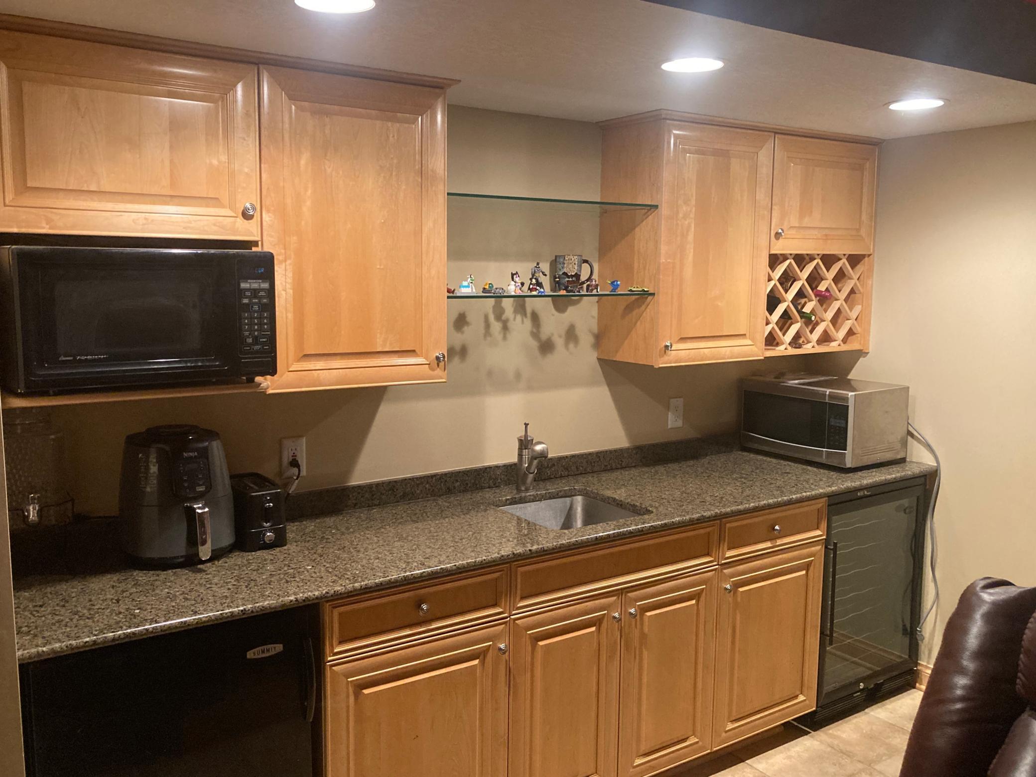 Wet bar in theatre room-basement