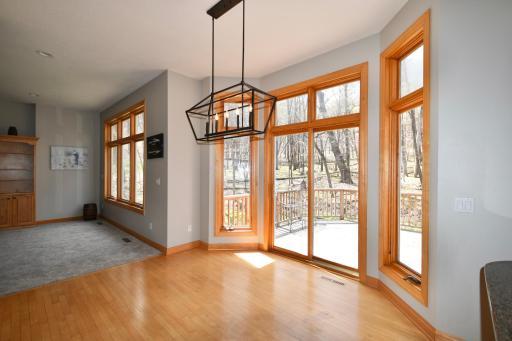 informal dining room with real wood floors