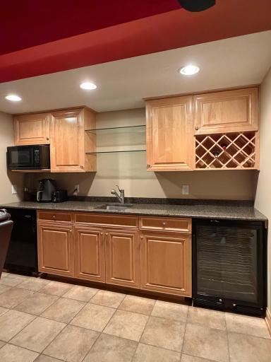 wet bar with microwave, refrigerator & wine fridge