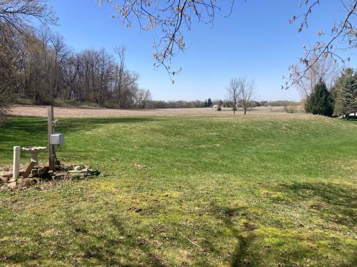 clearing to the north used as ice rink in the winter(or possible future detached garage/shed)