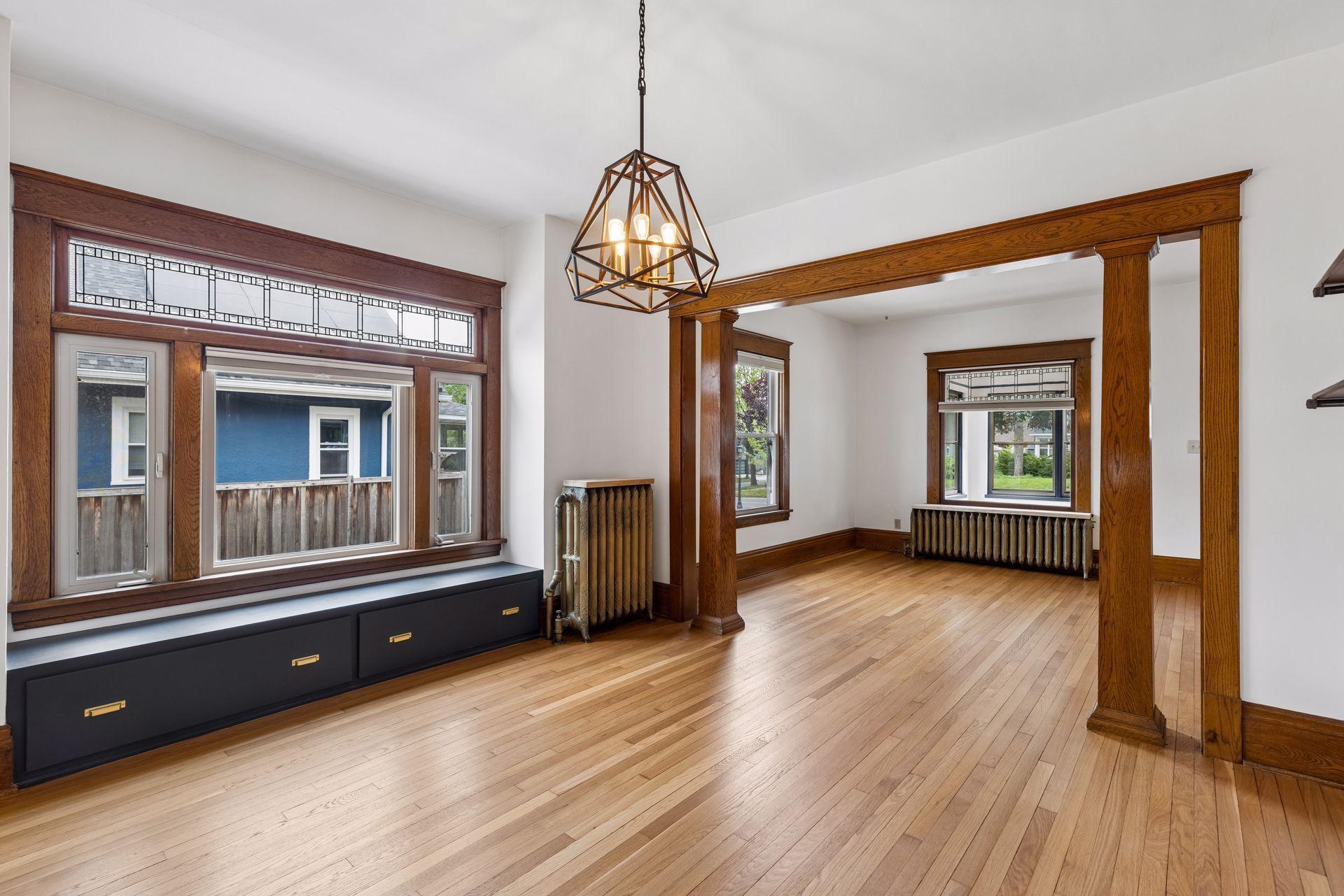 The dining room provides a beautiful picture window with leaded transom window and a built-in sun/storage bench.