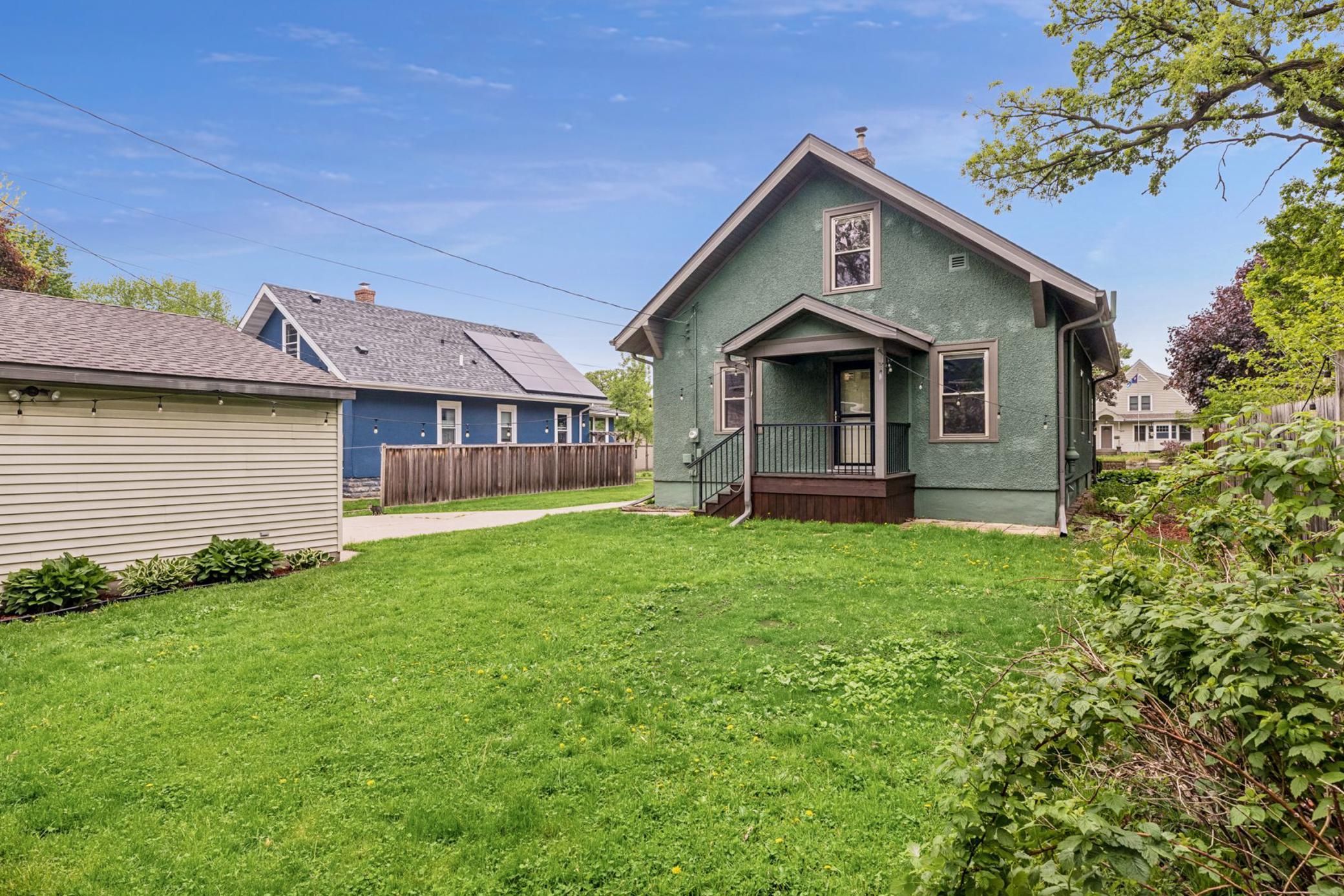 Private backyard with wood fencing.