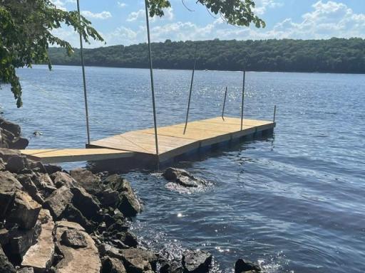 this was sellers old dock, you have an area for a dock, there is no dock included in purchase