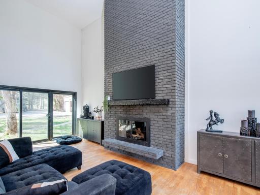 Another view of the fireplace and new Andersen patio door