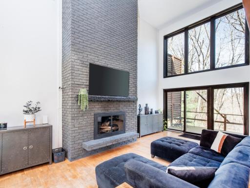 brick fireplace, tons of natural lights, new Andersen windows