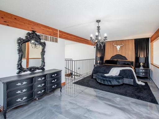 upper level bedroom area, newer metallic epoxy flooring