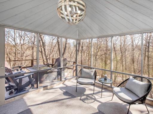 screen porch off the kitchen/main floor bedroom