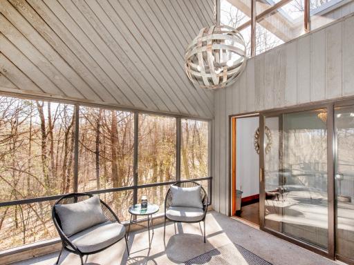 another view of the screen porch from the main floor bedroom