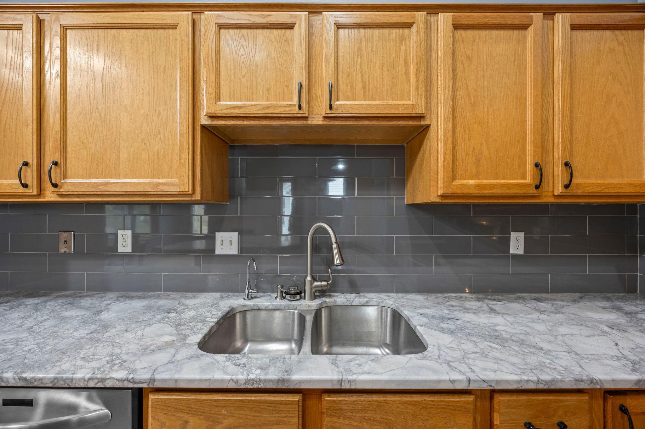 Lovely newer counters and tile backsplash