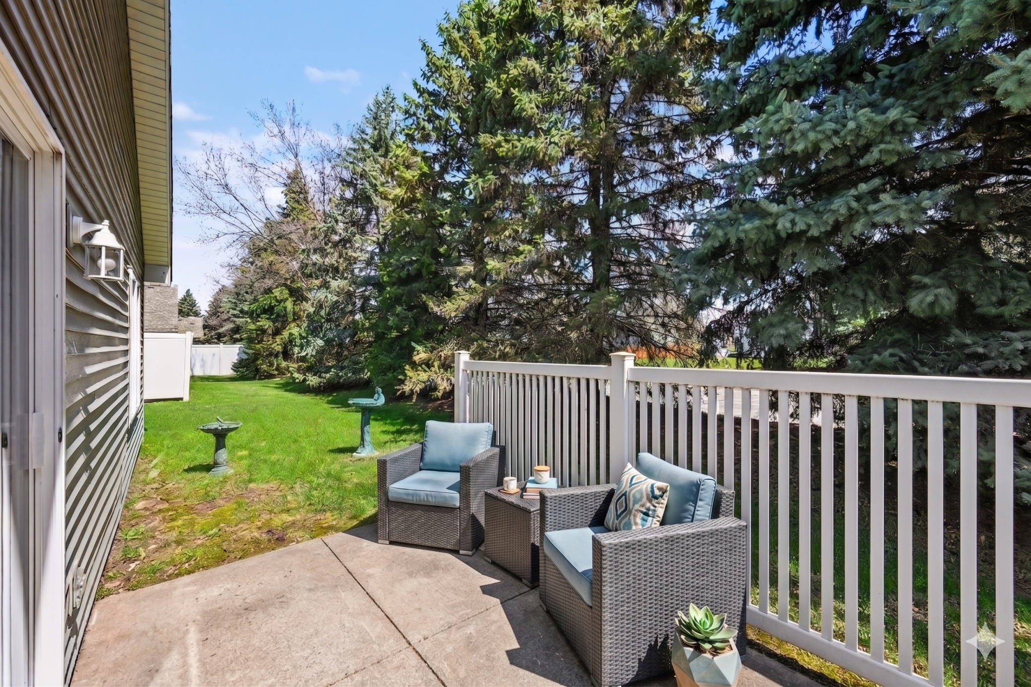 Here is a virtually staged rendition of the private patio.