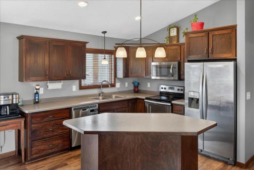Center island kitchen with stainless steel appliances