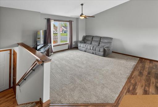 The living is open to the center island kitchen for a great room concept. Owner is a contractor and recently painted walls and cleaned carpets. Lives like new!