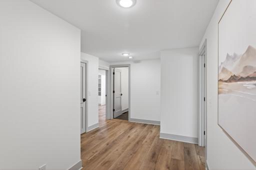 The lower level offers three additional bedrooms, a 3/4 bath, and ample storage.