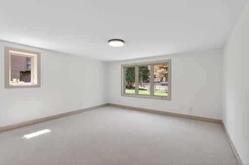Fifth bedroom, located on the lower level.