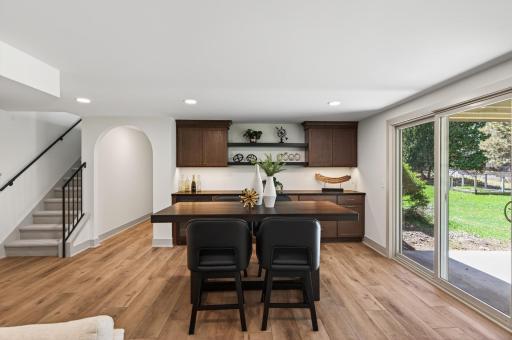 Complete with a bar with space for a bar table!
