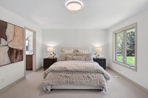 Retreat to the owner's suite designed for ultimate comfort and privacy.