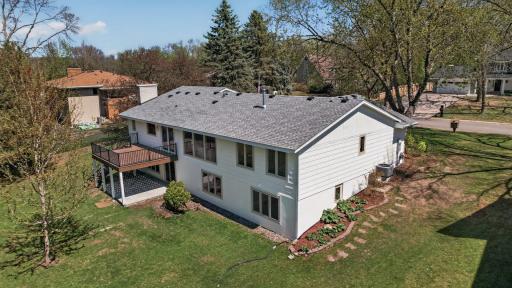 Enjoy a new expansive deck with stairs to grade extending your living space outdoors.