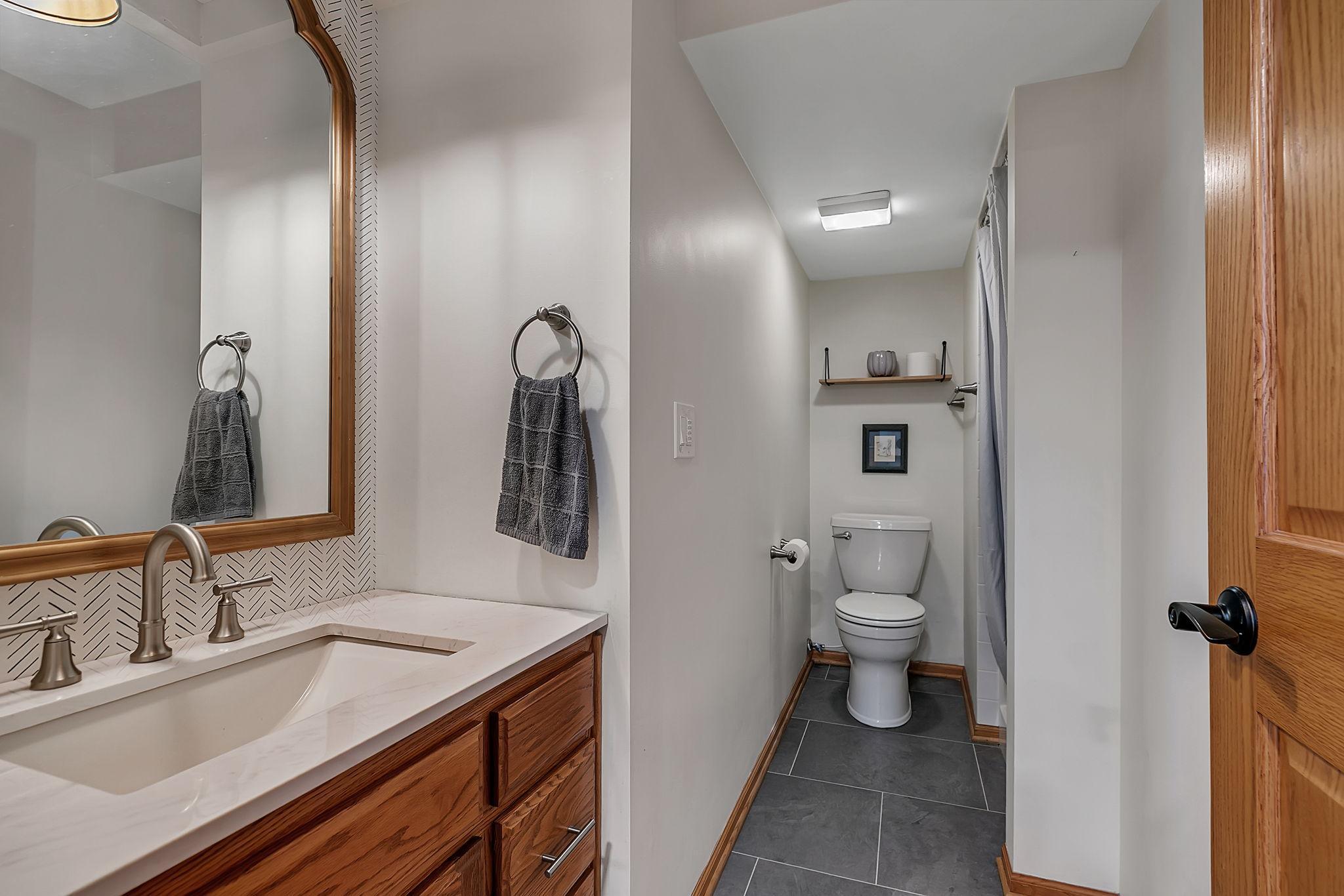 Nicely updated main floor three quarter bath.