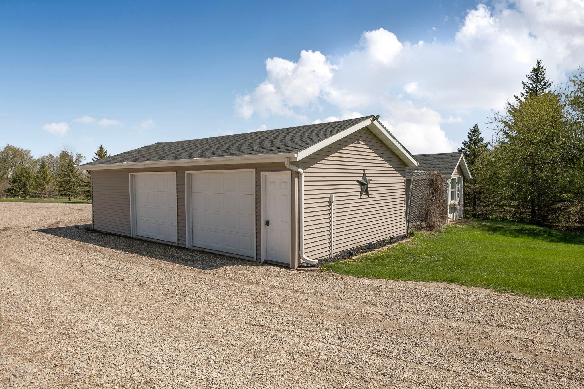 Detached two stall garage.
