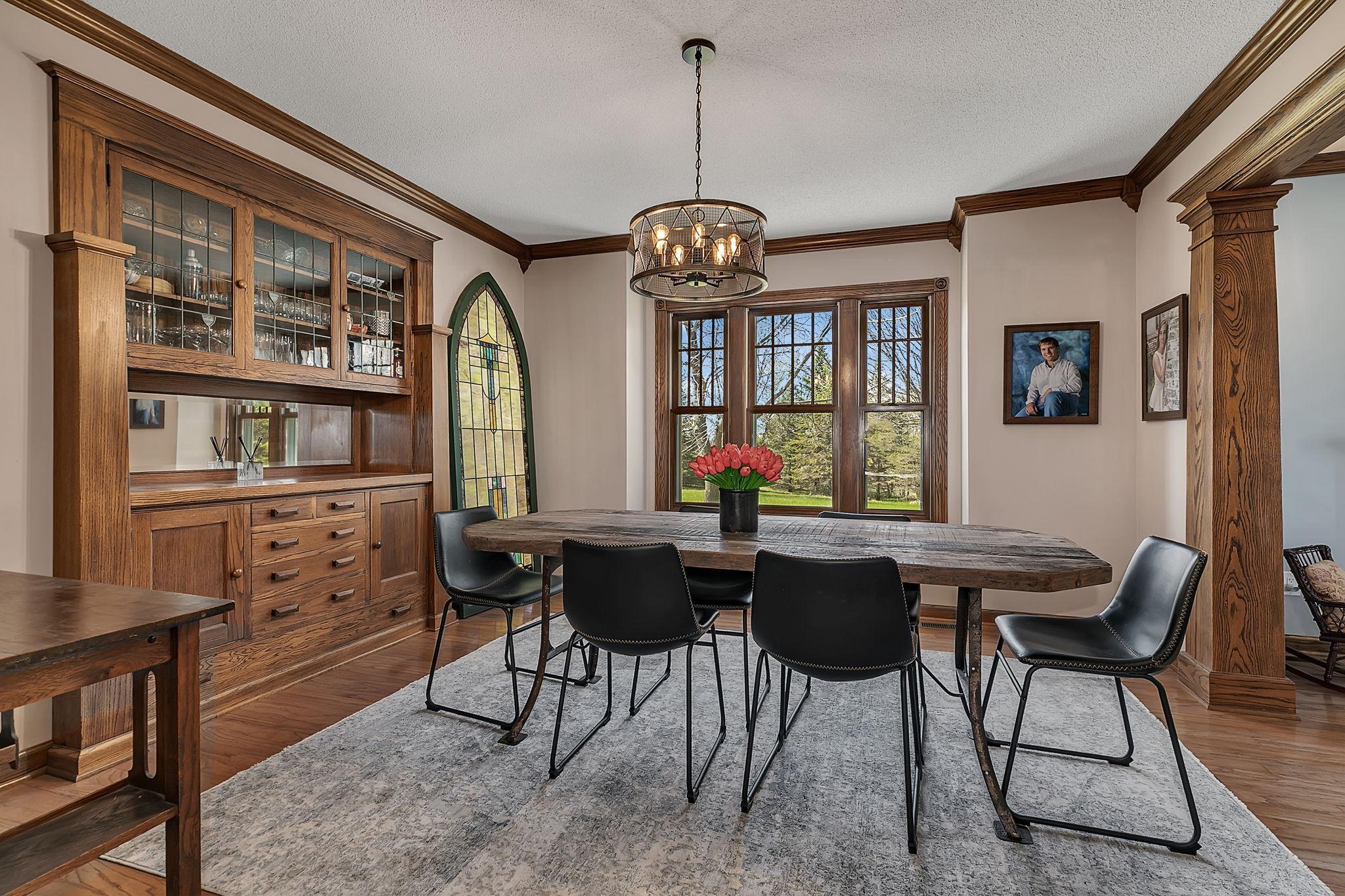 Formal dining room featuring gorgeous built-in and classic woodwork.