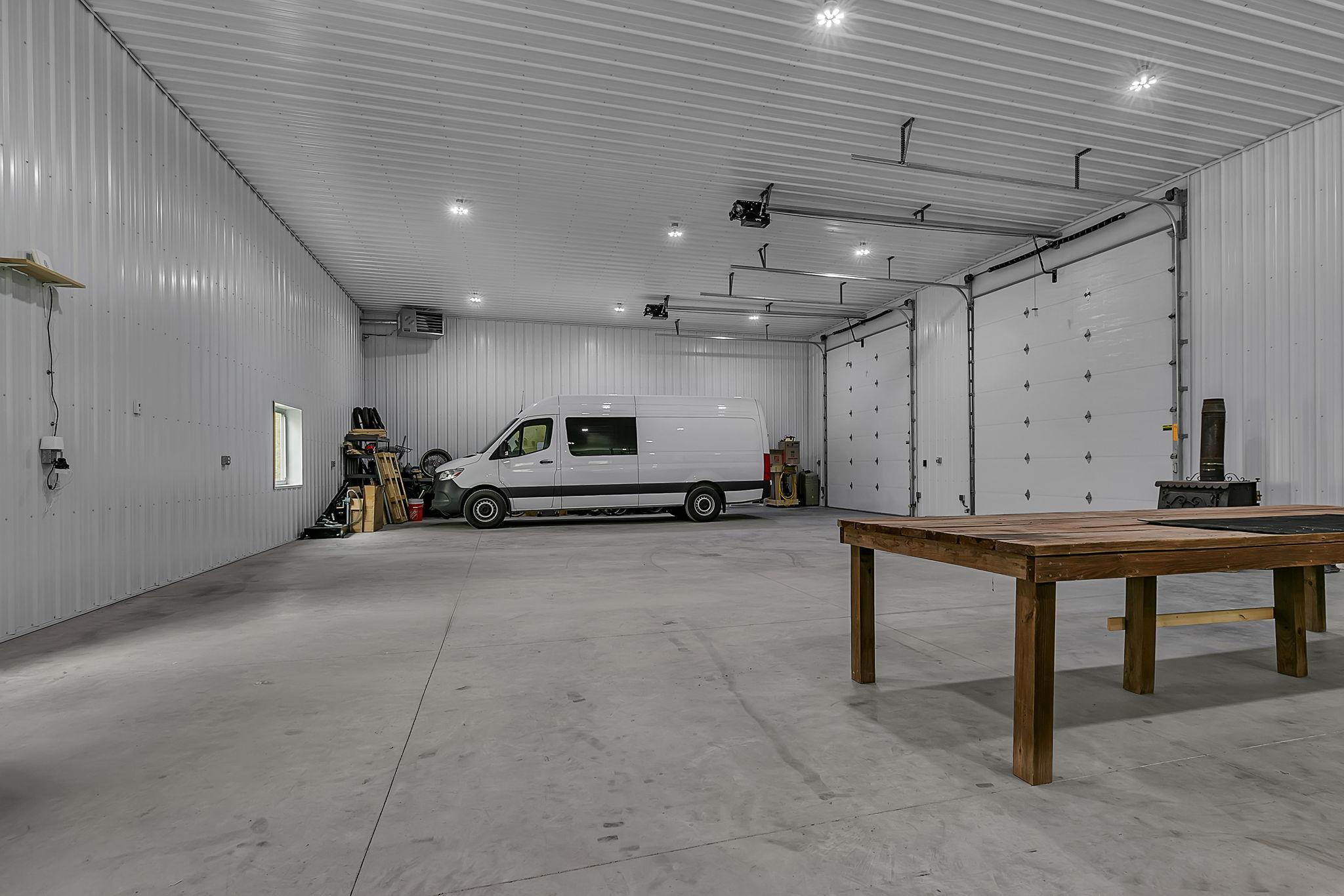 This amazing space is heated and has three 14' overhead doors with GDO's.