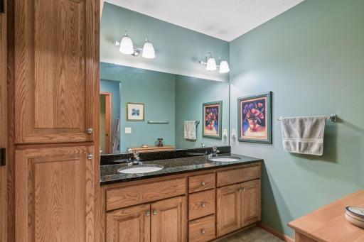 Main floor bath featuring dual sink vanity