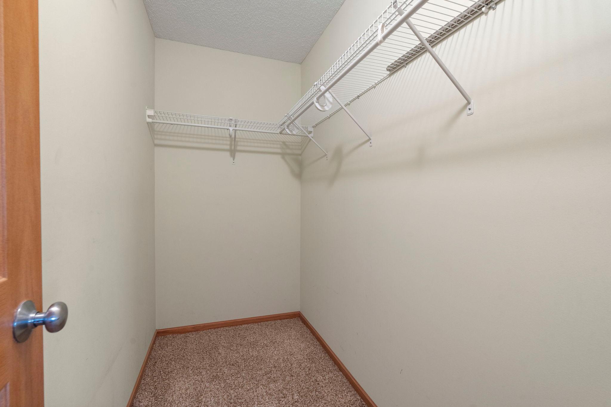 Primary walk-in closet - Upper level