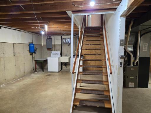 A blank canvas awaits you to make this unfinished basement whatever you like!