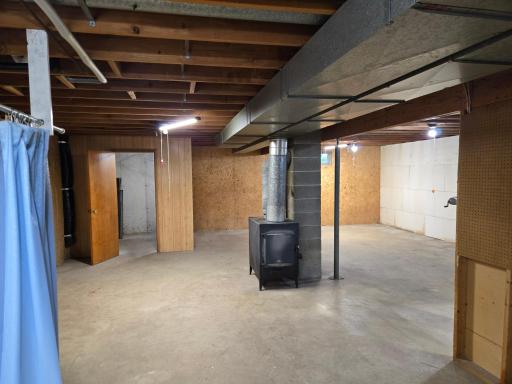 The storage room to the left was for "cold storage" for the owner's canned goods.