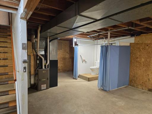 Newer high-efficiency furnace and the half bath - shower and a stool.
