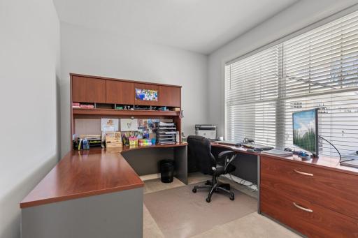 Office area off of front entry with views into the front yard