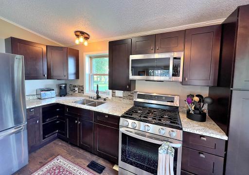 Updated kitchen with SS appliances and lake views