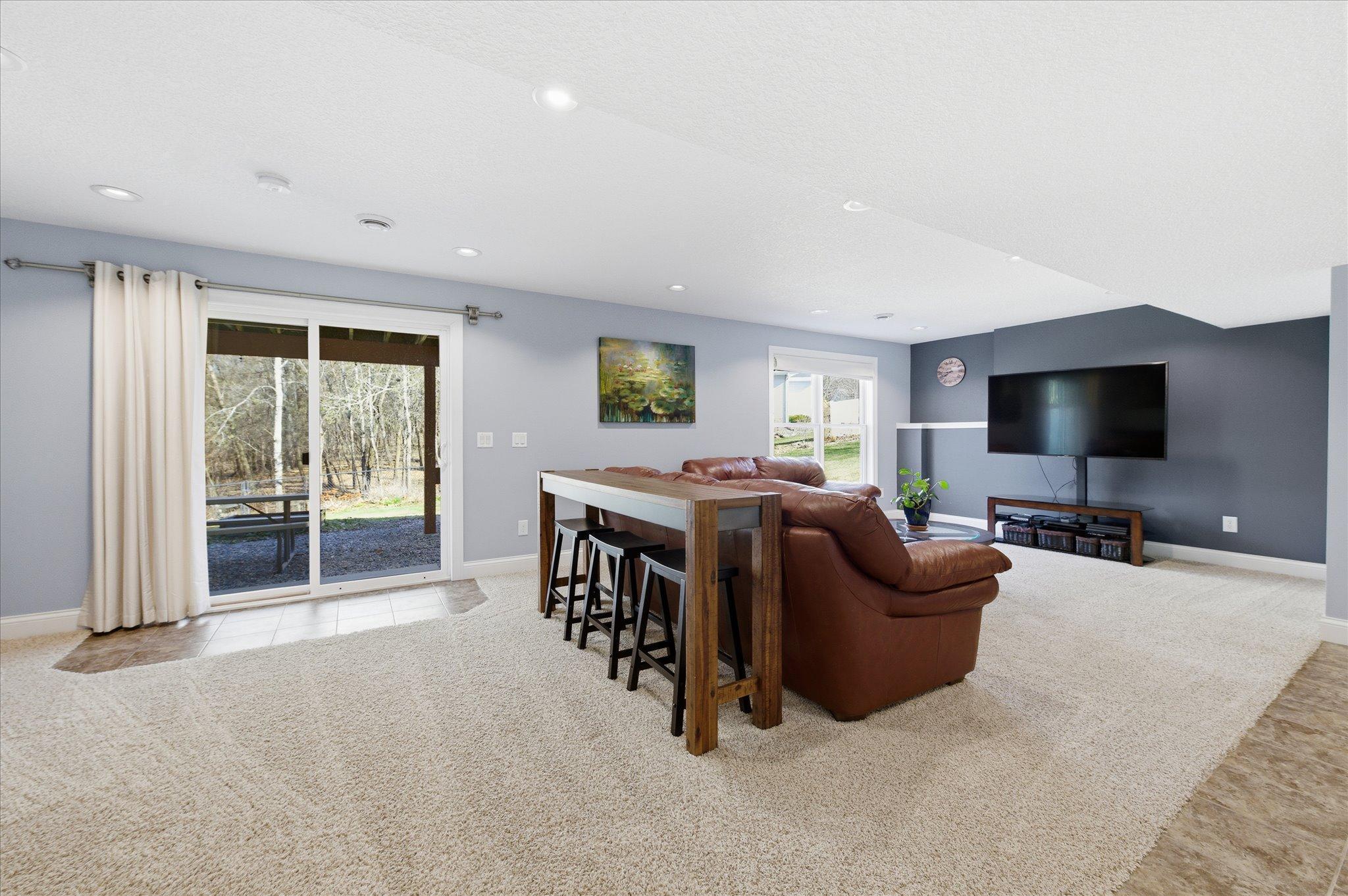 Lower Level walk-out family room with wet bar buffet