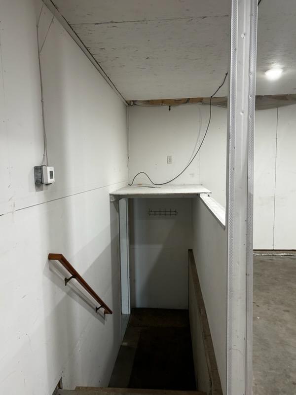 Stairway to attached garage/twin home