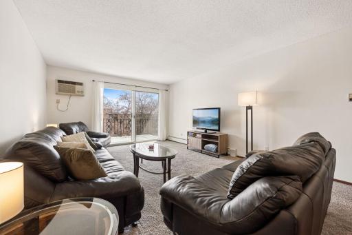 Bright and fresh large living spaces, and you'll enjoy the courtyard facing balcony/deck.
