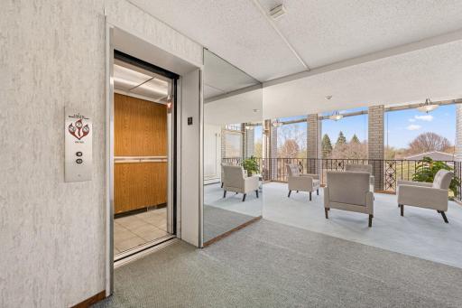 A view of the elevator and shared lobby space.